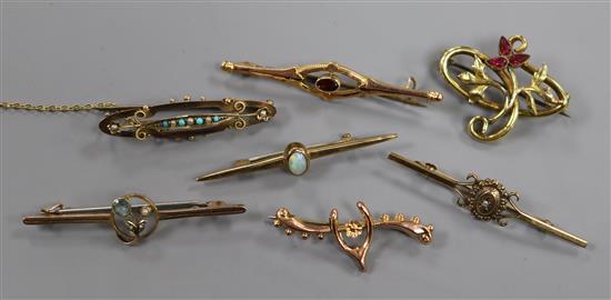 Seven assorted mainly early 20th century gem set bar brooches including three 9ct gold.